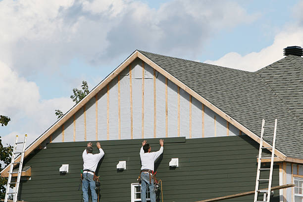 Professional Siding Contractor technician working in Lafferty, OH